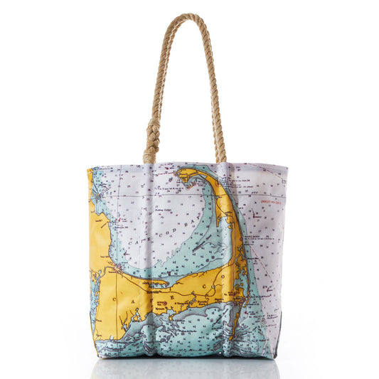 The Sea Bags Cape Cod Nautical Chart Tote with Clasp is crafted from recycled sail cloth and features sturdy rope handles, showcasing a vibrant nautical chart design in yellow, blue, and white that beautifully illustrates the Cape Cod coastline. by Sea Bags