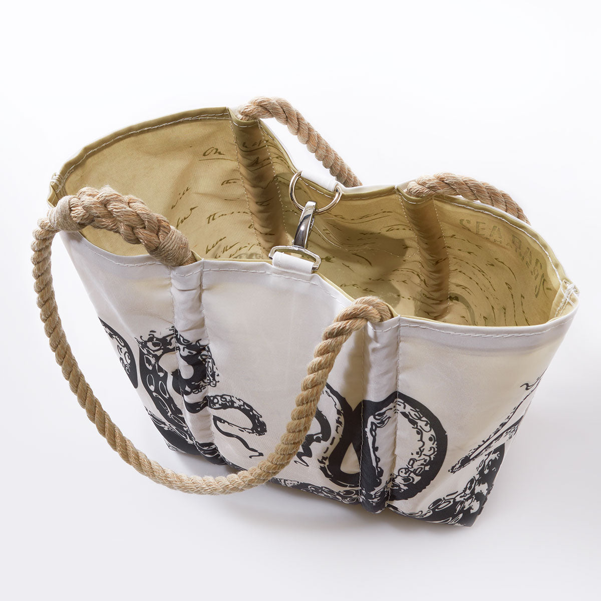 Sea Bags Octopus Handbag, crafted from recycled sail cloth and part of the Octopus Handbag collection, features rope handles, a beige interior, and an exterior octopus illustration inspired by Charles Darwin’s marine curiosity. Shown photographed from above on a white background. by Sea Bags