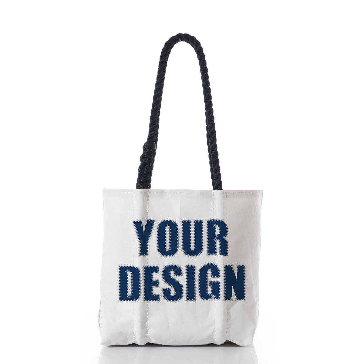 Sea Bags Custom Design Handbag features sturdy black rope handles and bold navy text reading YOUR DESIGN on the front, set against a crisp white background—a personalized accessory that perfectly showcases your unique style. by Sea Bags