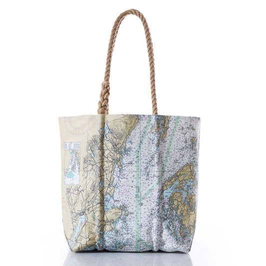 The Sea Bags Penobscot Bay Nautical Chart Medium Tote, made from recycled sail cloth and finished with rope handles, features a detailed nautical map of Penobscot Bay and is shown standing upright on a white background. by Sea Bags