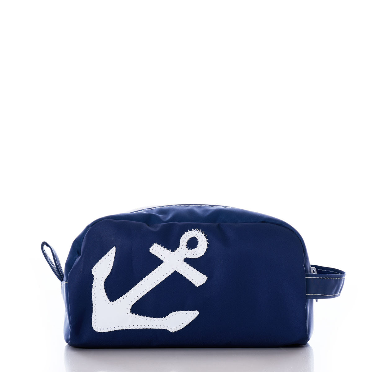 The Sea Bags White-on-Navy Anchor Toiletry Bag showcases a timeless white anchor design on a navy backdrop, complete with a sturdy top zipper closure and a practical side handle. This bag is an ideal addition to your travel essentials, combining style and functionality for all your journeys. by Sea Bags