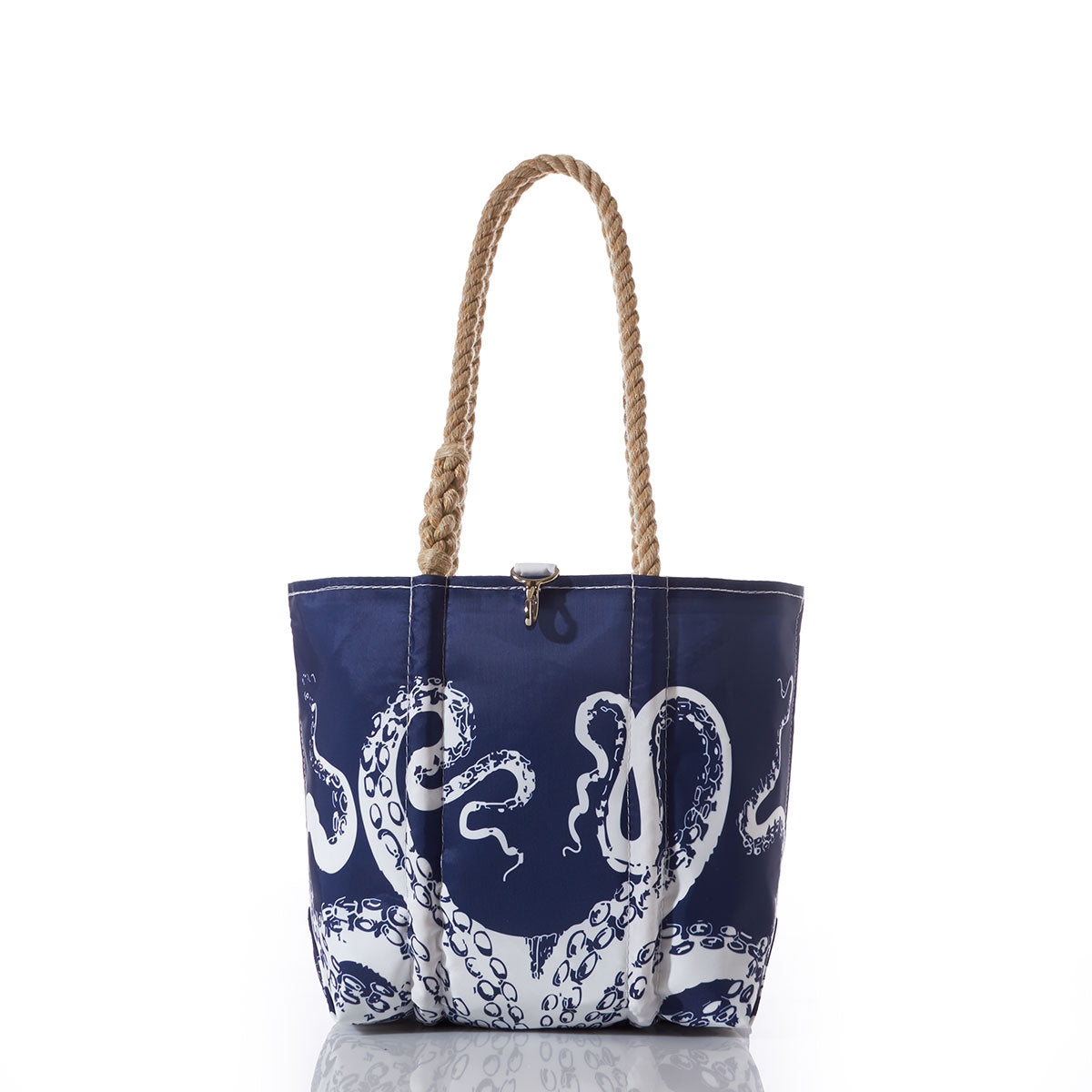 Sea Bags White on Navy Octopus Handbag features a striking white octopus tentacle design on a navy blue background and is accented with tan rope handles—an ocean-inspired accessory perfect for marine enthusiasts. by Sea Bags