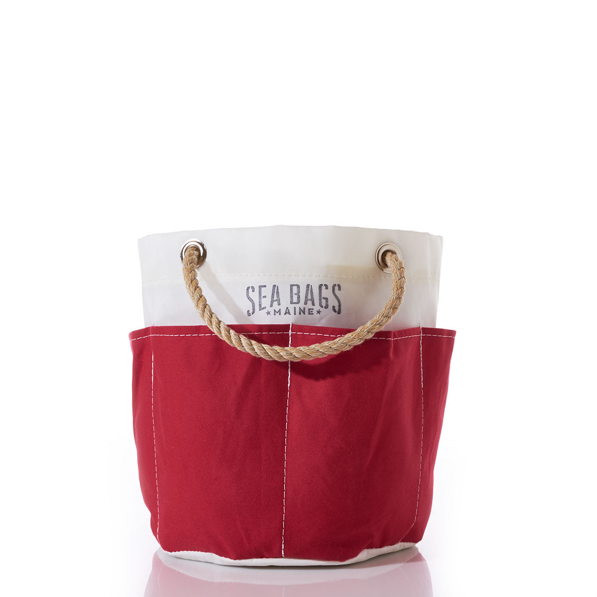 The All Purpose Red Tool Bucket Bag by Sea Bags is crafted from durable red canvas and features sturdy rope handles, convenient exterior pockets, and the Sea Bags logo on the front. by Sea Bags