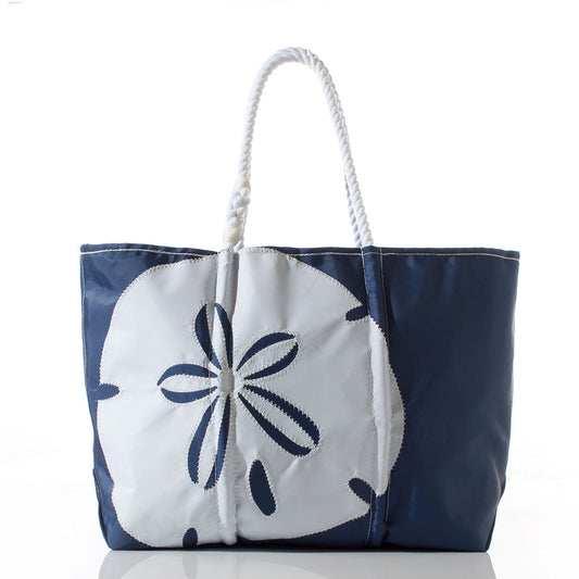 Sea Bags White on Navy Sand Dollar Large Tote, featuring durable white rope handles and a bold white sand dollar motif on navy, crafted from recycled sails for eco-friendly style, shown against a plain white background. by Sea Bags