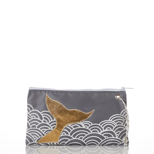 Introducing the Sea Bags Gold Mermaid Tail and Waves Large Wristlet: a gray zippered pouch made from recycled sail bag material, adorned with a shimmering gold mermaid tail applique and white wave patterns. Finished with a sturdy rope loop on the right side, this eco-friendly wristlet is perfect for everyday adventures. by Sea Bags