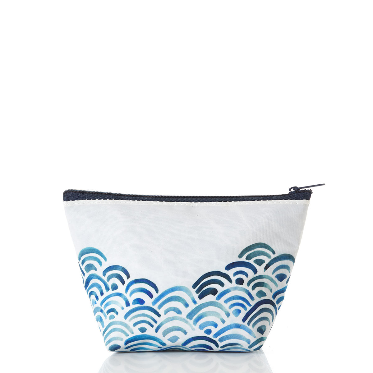 The Sea Bags Watercolor Waves Cosmetic Bag is a small white zippered pouch featuring a blue wave pattern at the bottom, crafted from recycled sailcloth for an eco-friendly touch—perfect as a cosmetic bag and ideal travel accessory; shown on a white background. by Sea Bags
