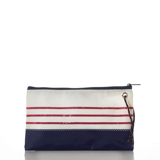 The Sea Bags Red Mariner Stripe Large Wristlet features a navy base, white upper section, and four bold horizontal red mariner stripes. Designed with a zipper closure and a convenient side loop with cord for easy carrying, this pouch is perfect for bringing nautical style to your everyday essentials. by Sea Bags