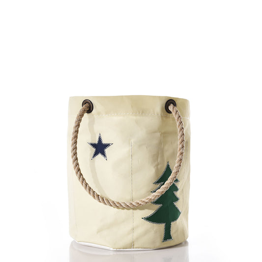The Maine Bicentennial Beverage Bucket by Sea Bags features rope handles and is crafted from recycled sail cloth, showcasing a navy blue star and green tree design inspired by the Maine 1901 state flag on its beige exterior. by Sea Bags