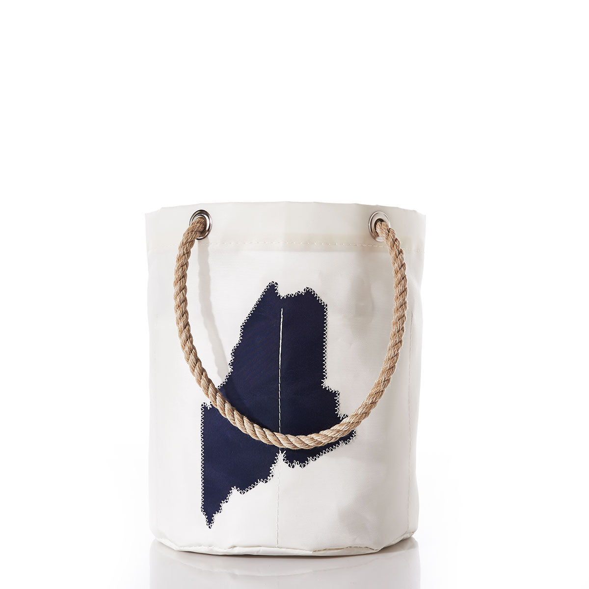 The State of Maine Beverage Bucket by Sea Bags features a white canvas design crafted from recycled sail cloth, accented with sturdy rope handles and a dark blue patch shaped like the state of Maine on the front, shown against a plain white background. by Sea Bags
