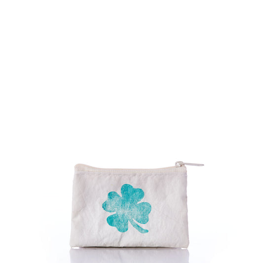 The Lucky Clover Everyday Carry Mini Pouch by Sea Bags is a small white pouch featuring a green clover design on the front, expertly crafted from recycled sail cloth and shown against a white background. by Sea Bags