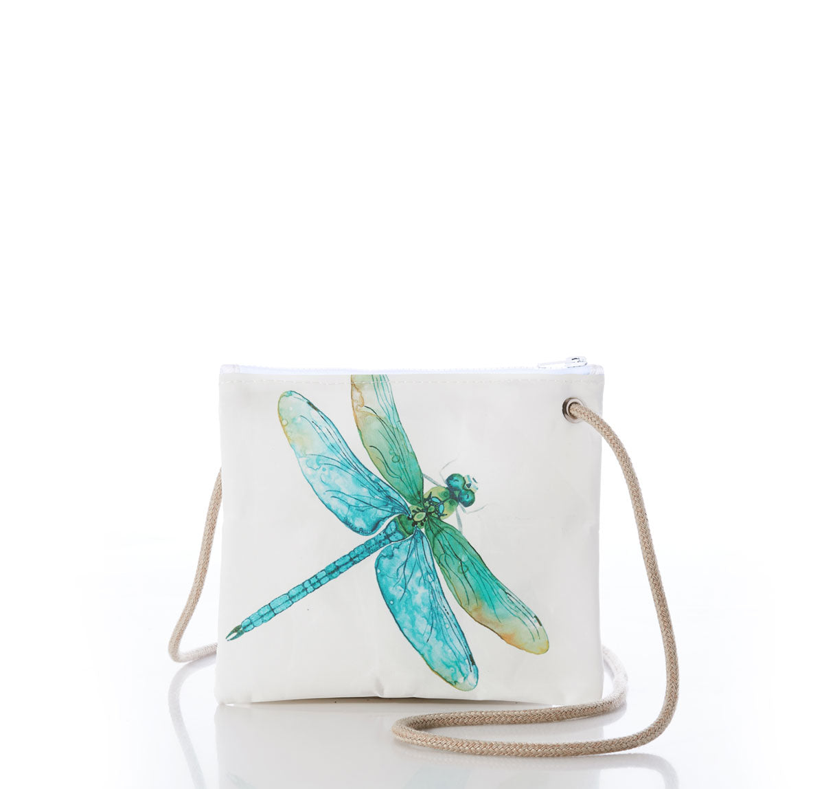 The Watercolor Dragonfly Slim Crossbody by Sea Bags is a small white crossbody bag featuring a blue-green watercolor dragonfly illustration on the front, a beige rope strap, and an original design by a local artist, displayed on a white background. by Sea Bags