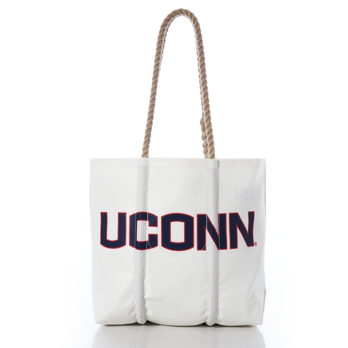 Introducing the UCONN Tote by Sea Bags—a stylish white tote featuring UCONN printed in bold navy and red letters on the front. Crafted with sturdy hemp rope handles, this practical bag has a clean white background and comes complete with a collegiate hang tag, making it both fashionable and perfect for everyday use. by Sea Bags