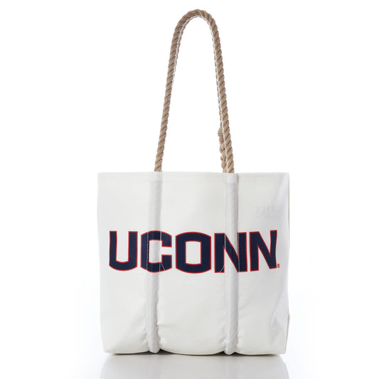 Introducing the UCONN Tote by Sea Bags—a stylish white tote featuring UCONN printed in bold navy and red letters on the front. Crafted with sturdy hemp rope handles, this practical bag has a clean white background and comes complete with a collegiate hang tag, making it both fashionable and perfect for everyday use. by Sea Bags