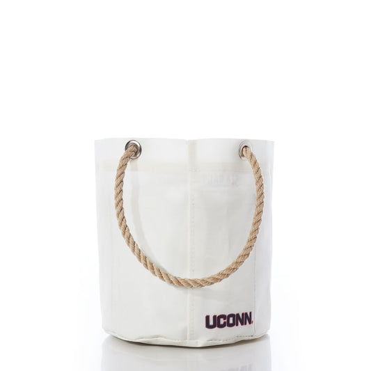 White recycled sail cloth UCONN Beverage Bucket by Sea Bags, featuring sturdy rope handles and metal grommets, with the UCONN logo in maroon lettering near the bottom right corner—ideal as a college dorm organizer or spirited school gift. by Sea Bags