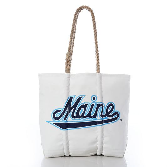 Sea Bags UMaine Tote—a white tote bag with rope handles, crafted from recycled sail cloth and featuring Maine in blue cursive script on the front—makes the perfect accessory to show your University of Maine school spirit; photographed against a white background. by Sea Bags