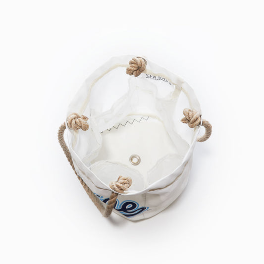 Top view of the UMaine Beverage Bucket by Sea Bags, crafted from recycled sail cloth in white with rope handles and knots, metal grommet at the base, and black zigzag stitching inside. by Sea Bags