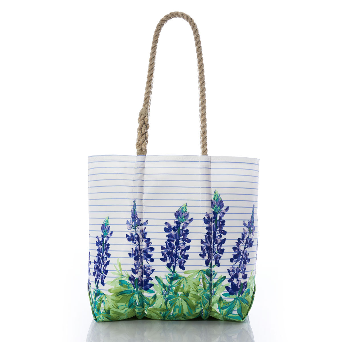 The Sea Bags Lupine Sailor Stripe Medium Tote, crafted from recycled sail cloth, features blue and green floral designs with blue horizontal stripes and two thick twisted rope handles—perfectly capturing true coastal charm. by Sea Bags