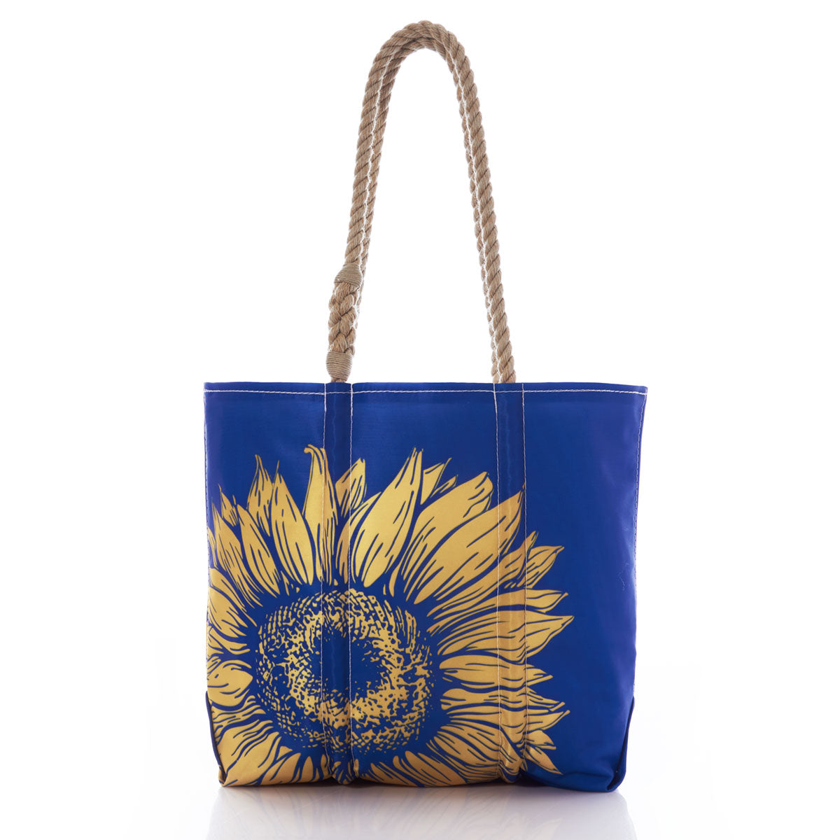 Sea Bags Sunflower Medium Tote—a blue tote featuring a large yellow sunflower design on the front and two twisted rope handles, displayed on a white background—makes the perfect bold floral accessory for any gardener. by Sea Bags