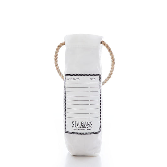 Multicolor Lobster Wine Bag by Sea Bags—a white cylindrical recycled sail bag with a rope handle, featuring a recycling information label and Sea Bags branding on the front. Displaying distinctive Maine lobster artwork, this functional and stylish wine carrier stands out against a white background. by Sea Bags