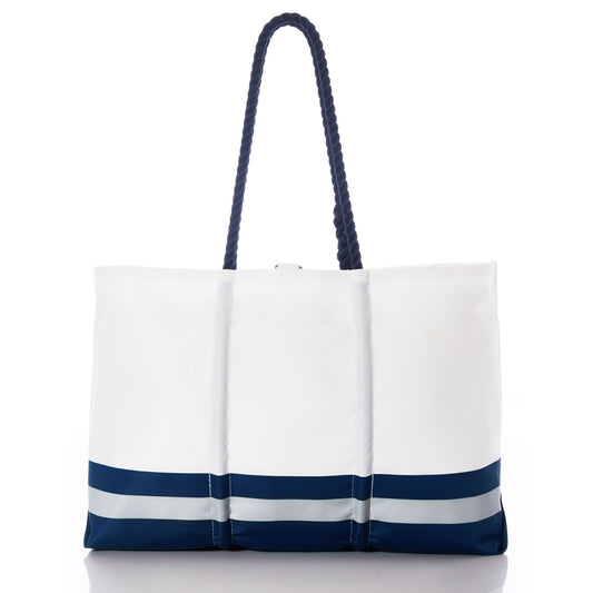 Introducing the Dallas Cowboys Tailgate Tote by Sea Bags—a white recycled sail cloth bag featuring two navy blue rope handles and two horizontal navy blue and gray stripes near the bottom. Perfect for any football fans tote collection. by Sea Bags