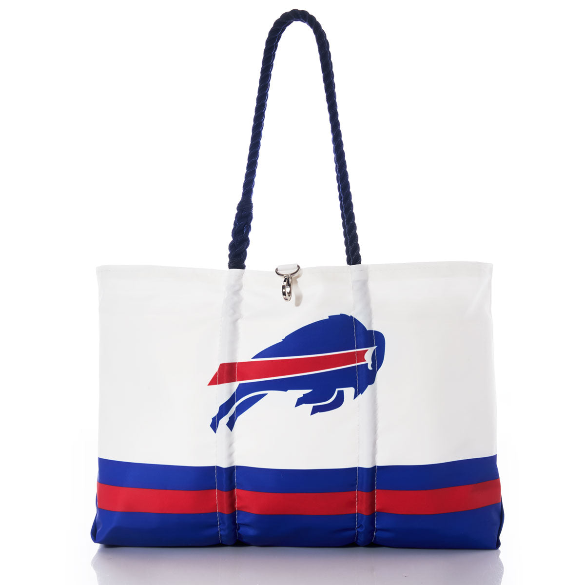 The Sea Bags Buffalo Bills Tailgate Tote, crafted from recycled sail cloth, features bold blue and red stripes with a blue buffalo logo and sturdy navy rope handles—making it the perfect tailgate accessory against a crisp white backdrop. by Sea Bags