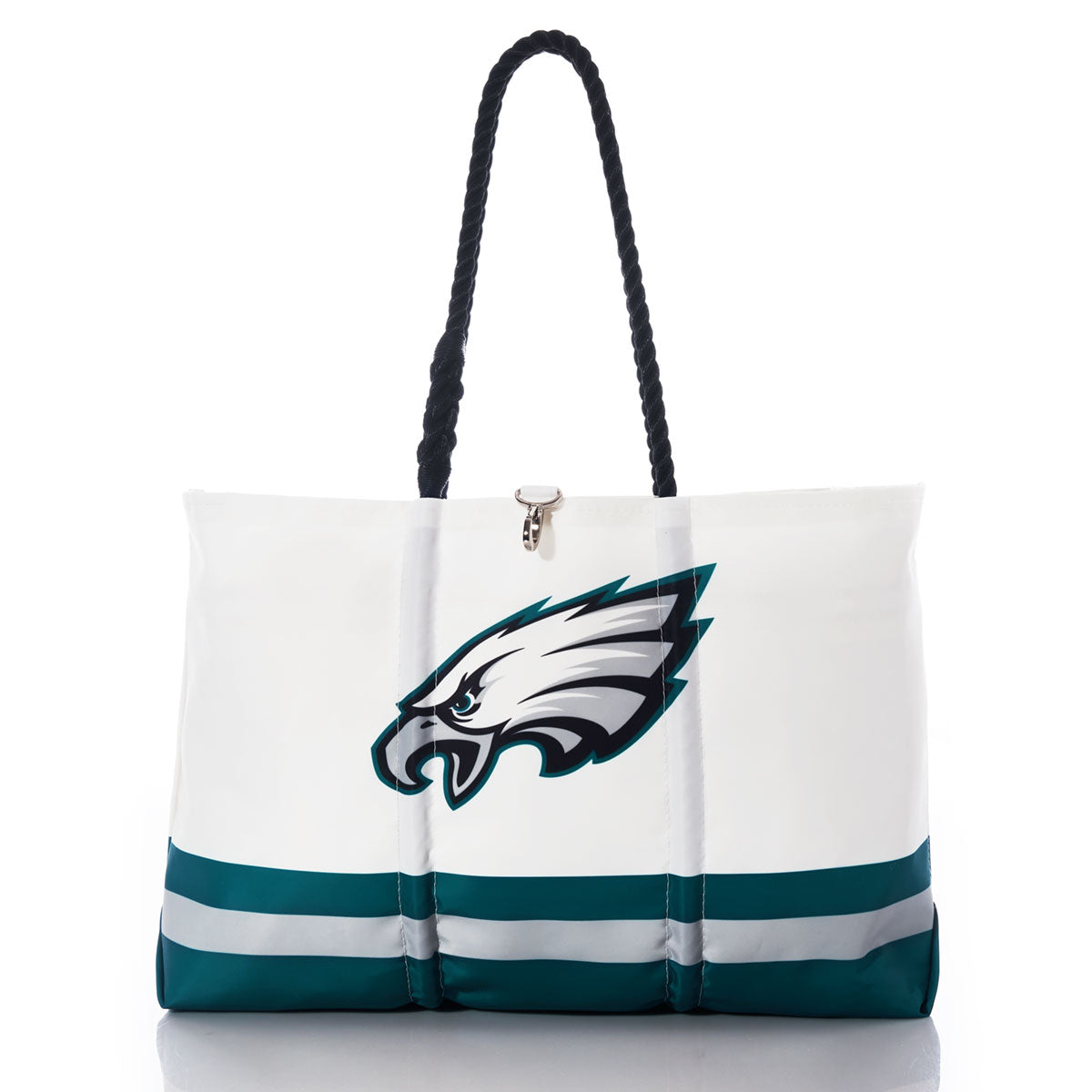 Introducing the Philadelphia Eagles Tailgate Tote by Sea Bags—a white recycled sail cloth bag with bold black rope handles, featuring a stylized eagle head logo and teal, gray, and black stripes near the base. Photographed on a white background, this tote is the perfect accessory for your next football tailgate. by Sea Bags