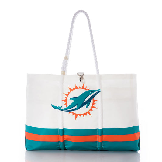 The Sea Bags Miami Dolphins Tailgate Tote is crafted from recycled sail cloth and features teal and orange stripes with a dolphin logo set against an orange sunburst. This tote includes white rope handles and is shown photographed on a white background. by Sea Bags