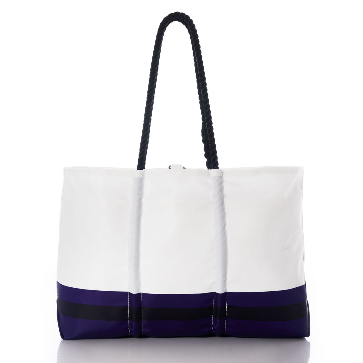 The Sea Bags Baltimore Ravens Tailgate Tote, crafted from recycled sail cloth, features a white body with black handles and a navy blue bottom edge accented by two horizontal black stripes. Displayed on a white background, this bold tote echoes the spirit of the classic Baltimore Ravens logo bag. by Sea Bags