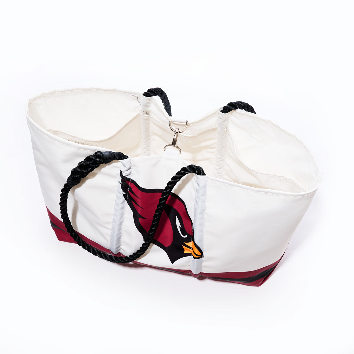 Sea Bags Arizona Cardinals Tailgate Tote—a white tote with black rope handles and a red cardinal logo on the side, crafted from recycled sail cloth—shown on a white background, perfect for any Cardinals fan. by Sea Bags