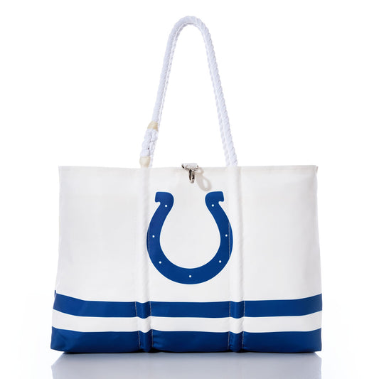 Introducing the Indianapolis Colts Tailgate Tote by Sea Bags: a white sail cloth tote adorned with bold blue stripes and a blue horseshoe motif on the front, inspired by the iconic Indianapolis Colts. Featuring sturdy white rope handles and a secure top zipper closure, this bag blends sporty style with everyday practicality. by Sea Bags