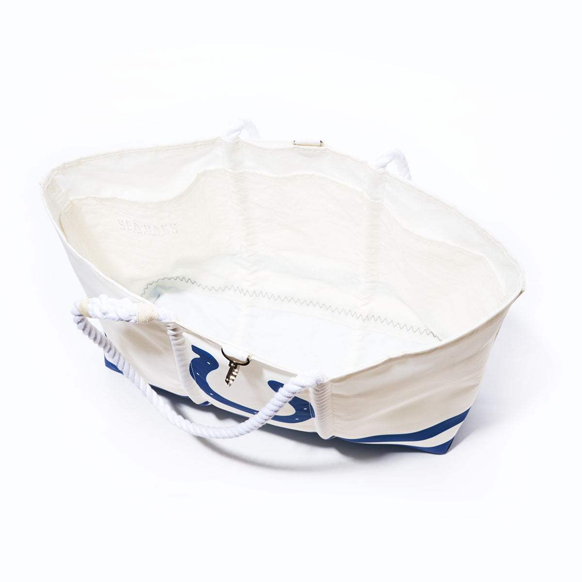 Indianapolis Colts Tailgate Tote by Sea Bags, featuring white and blue sail cloth with rope handles, shown from above with its interior visible, placed on a white background. by Sea Bags