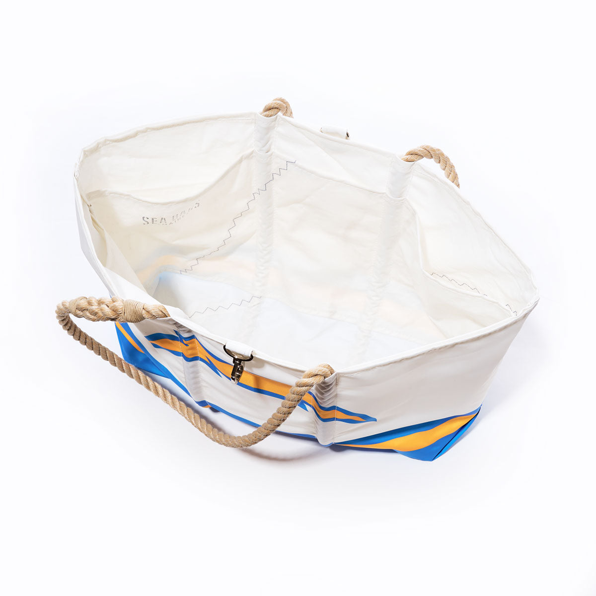 Sea Bags Los Angeles Chargers Tailgate Tote—crafted from large white recycled sail cloth with blue and yellow accents, sturdy rope handles, and an open top—photographed on a plain white background; the perfect bag for any Chargers fan’s tailgate collection. by Sea Bags