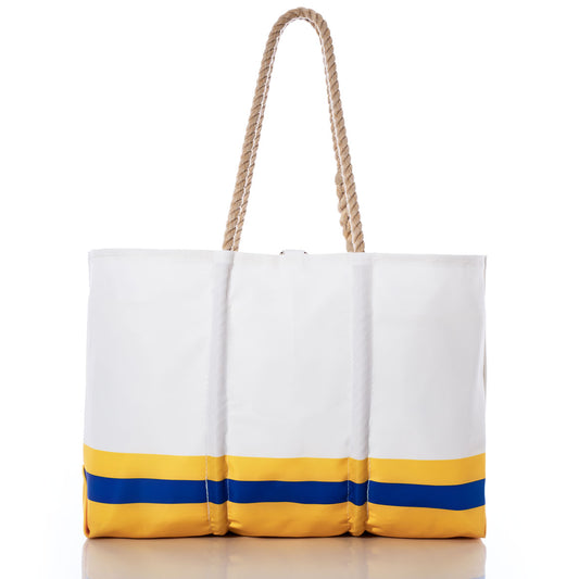 Sea Bags Los Angeles Rams Tailgate Tote, made from recycled sail cloth and featuring yellow and blue stripes near the bottom, with sturdy rope handles, shown against a white background. by Sea Bags