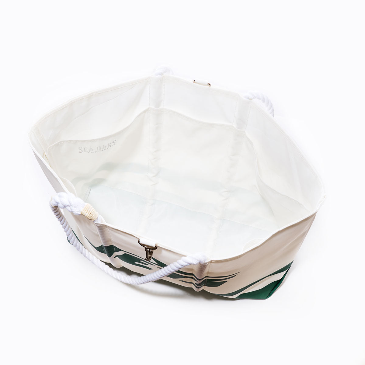 Top view of the Sea Bags New York Jets Tailgate Tote, an empty white sail cloth bag with rope handles and green design accents on the outer sides, inspired by a classic Jets aesthetic. by Sea Bags