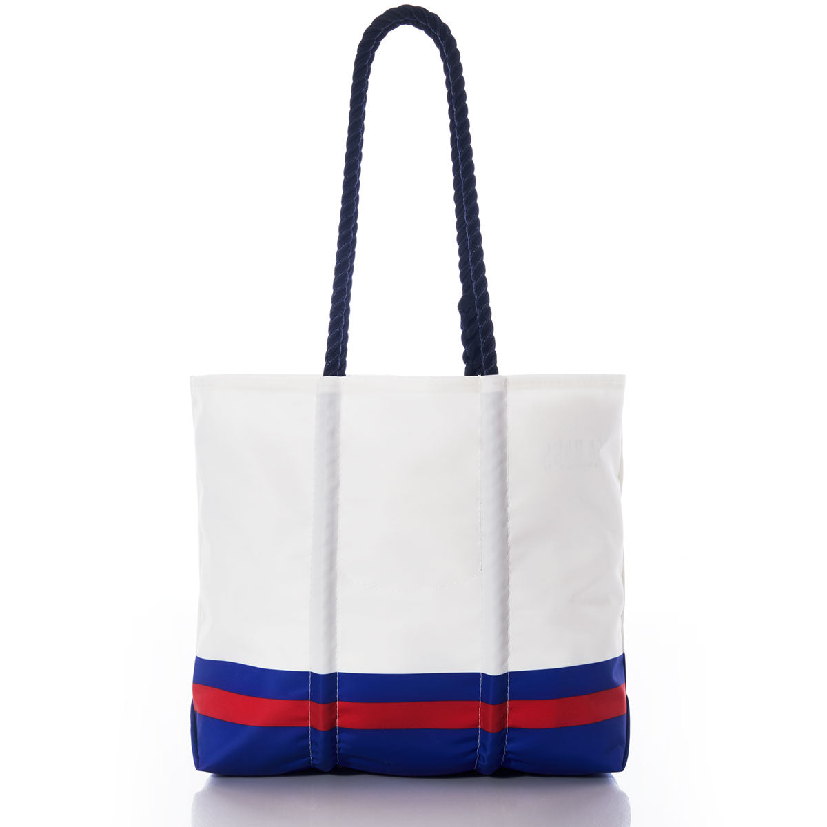 Introducing the Buffalo Bills Medium Tote by Sea Bags—a white recycled sail cloth bag with long navy rope handles and a blue base, accented with a red and blue horizontal stripe near the bottom. This durable logo tote is perfect for any Buffalo Bills fan. by Sea Bags