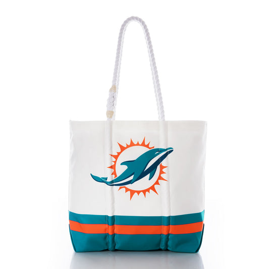 The Sea Bags Miami Dolphins Medium Tote features a stylized dolphin logo set against an orange sunburst on the front, with teal and orange stripes accenting the white base. Crafted from durable recycled sail cloth and finished with sturdy white rope handles, this eco-friendly tote combines lasting quality with iconic team spirit—perfect as a Miami Dolphins bag or for everyday use. by Sea Bags