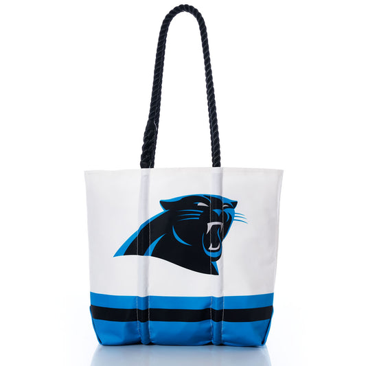 Sea Bags Carolina Panthers Medium Tote features sturdy black rope handles, the official Panthers logo, and distinctive blue and black stripes along the bottom. Expertly crafted from recycled sail cloth for durability, this tote is a stylish and practical choice for any Panthers fan or NFL enthusiast. by Sea Bags