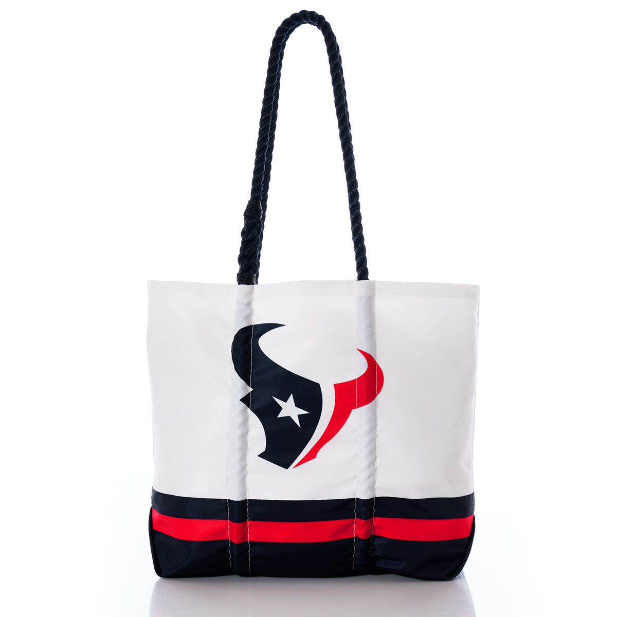 Sea Bags Houston Texans Medium Tote shown against a white background, featuring sturdy navy handles and the teams logo with red and navy stripes near the bottom. Crafted from durable recycled sail cloth, this eco-friendly tote is a stylish choice for any Houston Texans fan. by Sea Bags