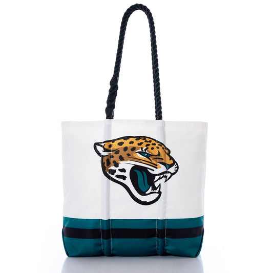 The Jacksonville Jaguars Medium Tote by Sea Bags is crafted from recycled sail cloth and features sturdy black rope handles, with an oversized NFL logo and the iconic jaguar emblazoned on the front in white and teal. by Sea Bags