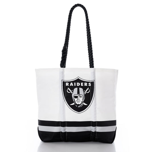 The Sea Bags Las Vegas Raiders Medium Tote is an eco-friendly bag crafted from recycled sail cloth, featuring the Raiders logo on white with black rope handles and two black horizontal stripes near the bottom—all shown on a white background. by Sea Bags