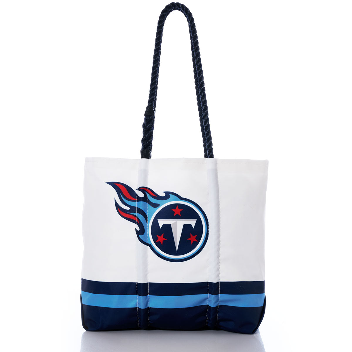 Introducing the Sea Bags Tennessee Titans Medium Tote—crafted from white recycled sail cloth with navy handles and blue stripes, featuring the official team logo prominently on the front. An ideal eco-friendly bag for dedicated Titans fans. by Sea Bags