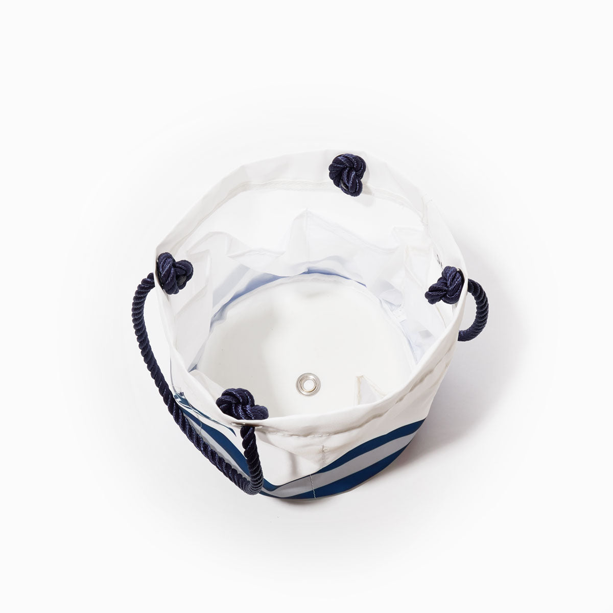 Top view of an open white and blue striped Sea Bags Dallas Cowboys Beverage Bucket with navy rope handles and a silver grommet on the base, shown on a white background—perfect as a stylish accessory or sustainable cooler for your next outing. by Sea Bags