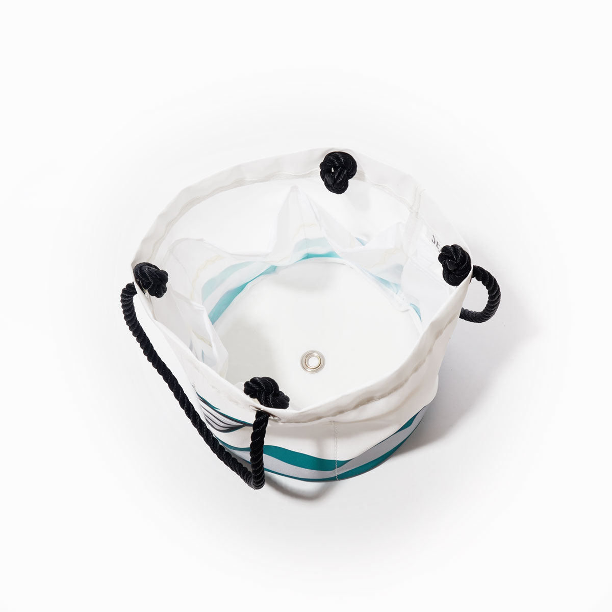 Philadelphia Eagles Beverage Bucket by Sea Bags, crafted from recycled sail cloth in white and teal, features a round canvas design with black rope handles and a metal grommet at the base; shown empty on a white background. by Sea Bags