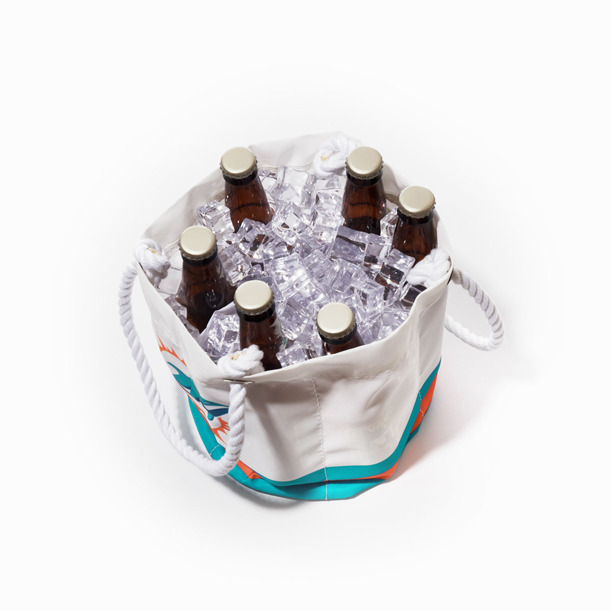 The Sea Bags Miami Dolphins Beverage Bucket, featuring a white base with turquoise and orange accents inspired by the team, is pictured from above holding six capped glass bottles nestled in ice. by Sea Bags