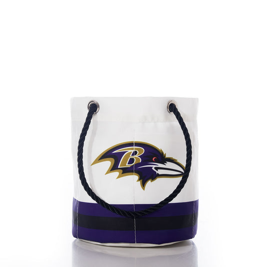 The Sea Bags Baltimore Ravens Beverage Bucket is a white, bucket-style beverage holder with black rope handles, decorated with the teams logo and purple and black stripes at the bottom, shown against a white background. by Sea Bags