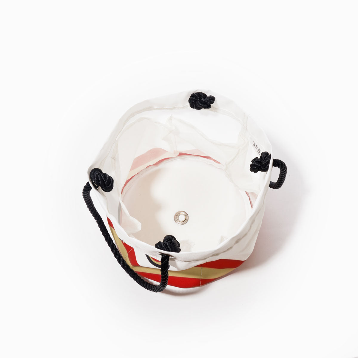 A top view of an open, round Sea Bags San Francisco 49ers Beverage Bucket with black rope handles and a central metal grommet, crafted from recycled sail cloth cooler material, photographed on a white background. by Sea Bags