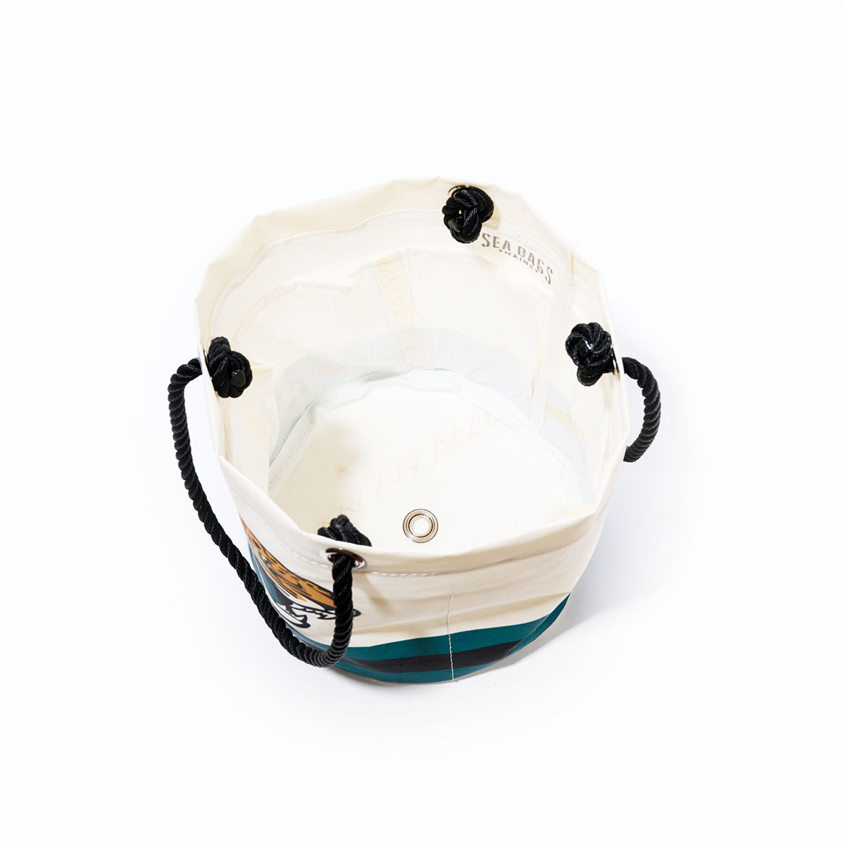 A round, white and blue-striped Sea Bags Jacksonville Jaguars Beverage Bucket featuring black rope handles and an eyelet on the bottom, shown from above on a white background. by Sea Bags