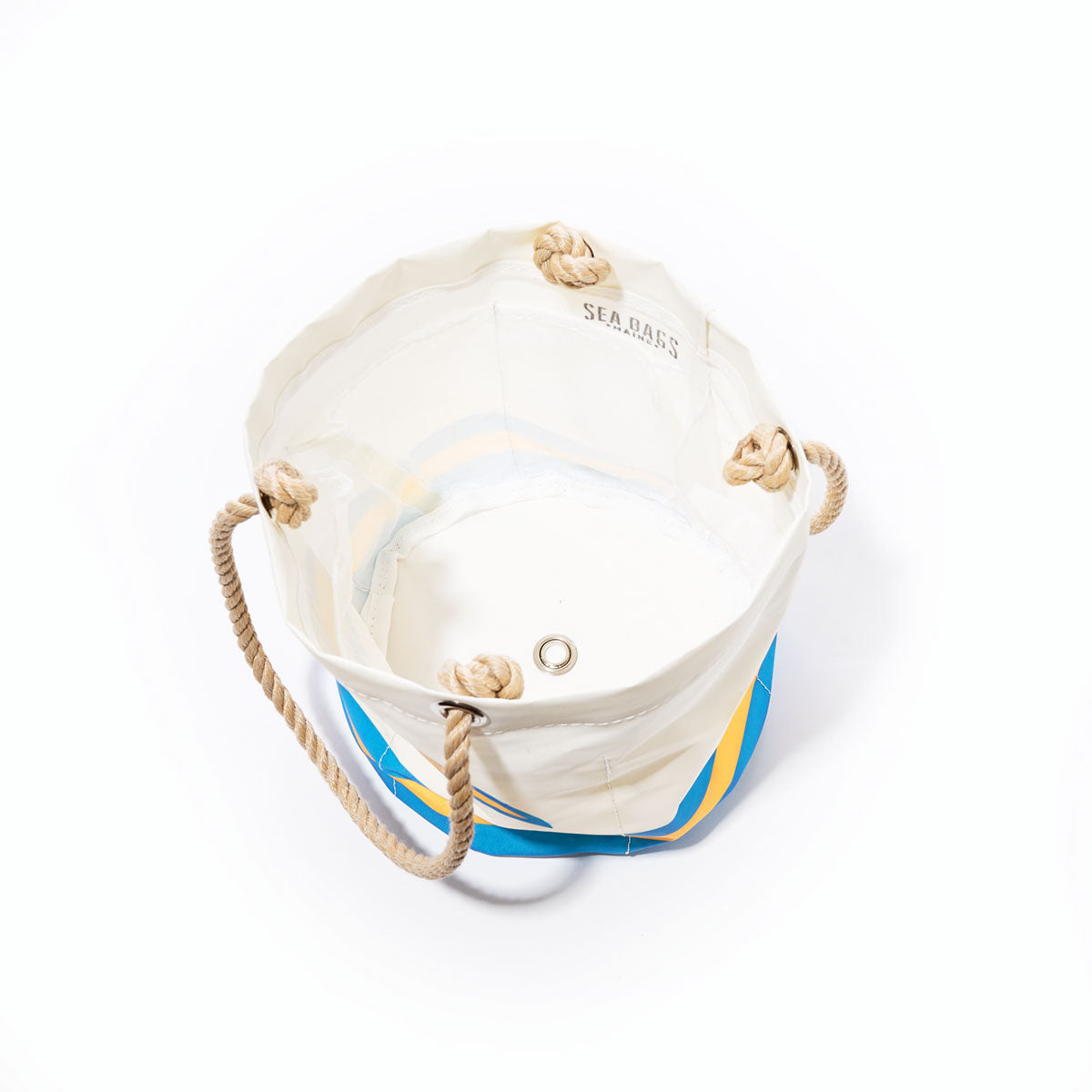 The Los Angeles Chargers Beverage Bucket by Sea Bags features white and blue recycled sail cloth, tan rope handles, and a metal grommet on the inner base, photographed on a white background—a sustainable cooler inspired by the Los Angeles Chargers. by Sea Bags