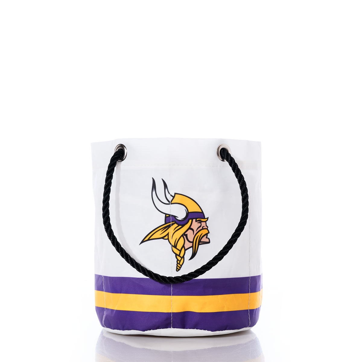 Show off your team spirit with the Minnesota Vikings Beverage Bucket by Sea Bags. This white bucket bag features bold purple and yellow stripes, black rope handles, and the iconic Minnesota Vikings logo on the front. Perfect as a stylish beverage bucket or sustainable cooler, it’s ideal for any gathering. Shown against a plain white background. by Sea Bags