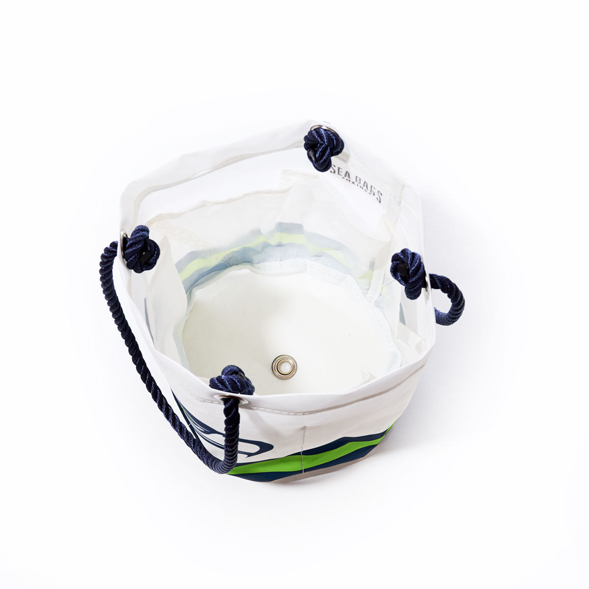 Seattle Seahawks Beverage Bucket by Sea Bags, shown from above, reveals a spacious interior and a metal grommet at the bottom—crafted from recycled sail cloth, this stylish and eco-friendly bucket is perfect for fans. by Sea Bags